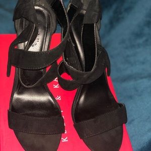 Black high heels with straps and a little bow!